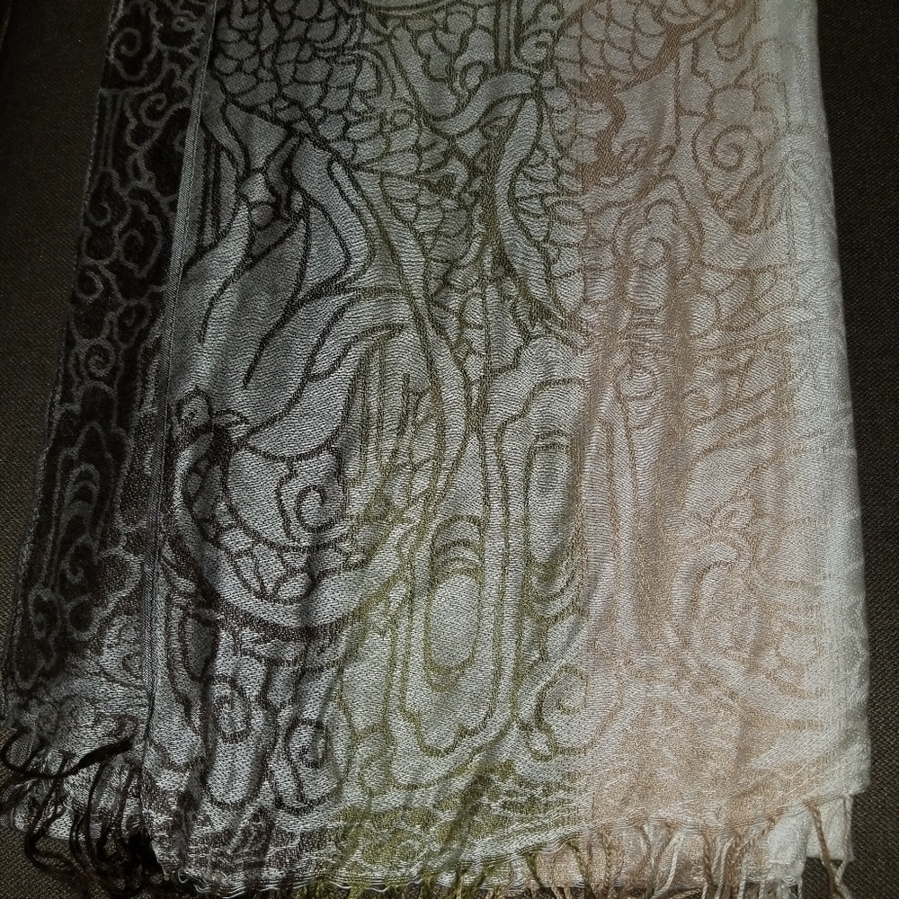 Nice shawl or wrap.  Multi, goes with many things